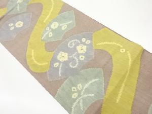 手織り紬絞り地紙に草花模様袋帯